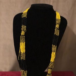 Yellow and black beads necklace from Kenya.